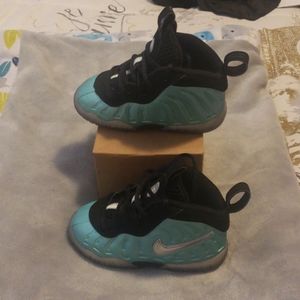 Black and teal Foamposite.